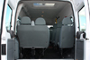 14-Seater Ford Transit rear view with 13+1 seats